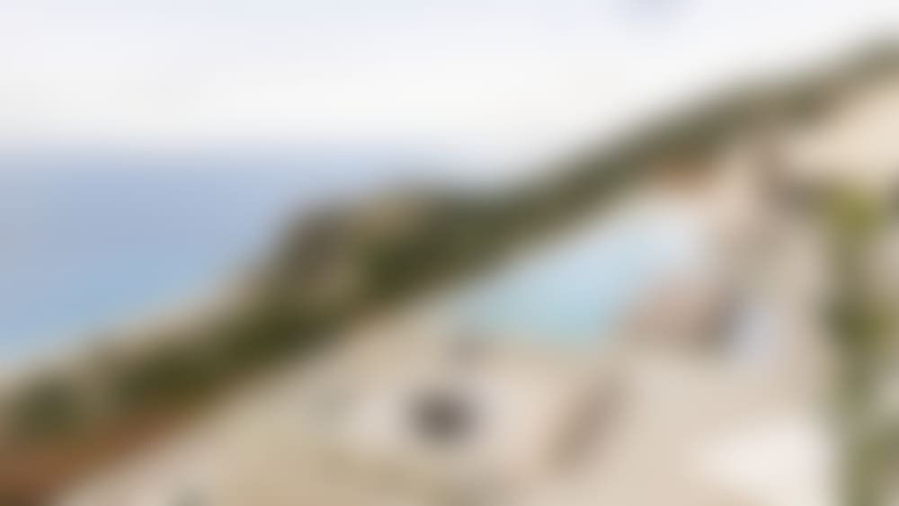 The main terrace at Mythea offers plenty of options for al fresco fun and relaxation.